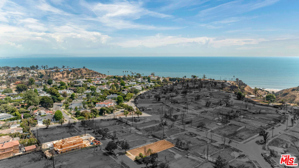 Nestled in El Medio Bluffs, this 5,747-square-foot homesite presents a prime opportunity to build new in one of Pacific Palisades' most cherished neighborhoods. Situated within minutes of Palisades Village and Will Rogers Beach, the location offers a seamless blend of coastal charm and modern convenience. Formerly home to a 2007-built Cape Cod residence featuring 5 bedrooms, 5 bathrooms, and 4,324 square-feet of living space, the property is now a blank canvas with extraordinary potential. Included in the sale are architectural plans for the former residence, a grading report (2005), a soils report (2025), and the final debris removal permit. Ideally located with quick access to acclaimed local amenities, the beach, and the greater Westside via PCH and Sunset Boulevard, 16032 Miami Way represents a compelling opportunity to create a bespoke coastal retreat in a premier enclave.