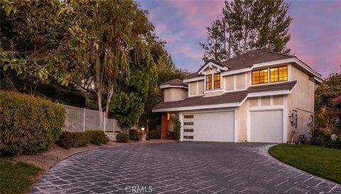 Photo of 25546 Hardy Place, Stevenson Ranch, CA 91381 (MLS # SR26054422)