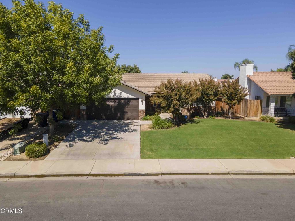 Freshly updated 4-bedroom, 2-bath home in a desirable Northwest neighborhood near Hageman Road and Jewetta Avenue. Extensively renovated just before hitting the market, it features new carpet, luxury vinyl plank flooring in the kitchen and baths, freshly painted interiors, refinished kitchen and bathroom cabinets, and stainless-steel appliances--making it truly move-in ready. A spacious family room with a cozy fireplace flows into a bright kitchen dining area, offering an ideal space for everyday living and entertaining. The front and back yards are nicely landscaped, and a charming courtyard in the backyard provides a peaceful retreat. Conveniently located near shops, dining, and highly rated schools, this home blends comfort, style, and location. Don't miss your chance to see it before it's gone!