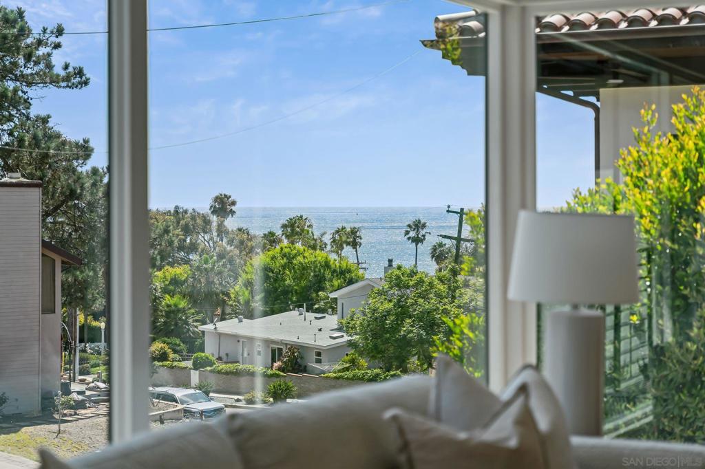 Situated in the most prime location in all of Sunset Cliffs, 4414 Piedmont is a tastefully remodeled, single-story ocean view home just two blocks from the water. Enjoy sit-down ocean views directly from the living room through expansive new windows, as well as from multiple other vantage points throughout the home. The open floor plan flows effortlessly into a chef’s kitchen featuring custom cabinetry, Taj Mahal quartzite natural stone countertops with waterfall edges, high-end appliances, a Delta sink and pot filler, and a walk-in pantry. The spacious primary retreat offers a large walk-in closet, an oversized shower, a soaking tub, and elegant Delta faucets and hardware. Two additional bedrooms are complemented by two beautifully finished full bathrooms, and the home includes an interior laundry area for added convenience. Thoughtfully upgraded throughout, the home features brand-new windows, a new roof, new central AC, a new water heater, three-panel shaker interior doors, and engineered white oak hardwood flooring. Outside, both the front and backyard have been fully landscaped with fresh sod, plants, and mulch, creating a clean and inviting outdoor setting. In addition to the two-car garage and spacious driveway that can accommodate multiple vehicles, there is gated access to the backyard offering additional parking potential for cars, recreational toys, or extra space for entertaining. With the ocean just a short walk away and Sunset Cliffs’ best shopping and dining only minutes from your door, this is an exceptional opportunity to own a turn-key coastal retreat in