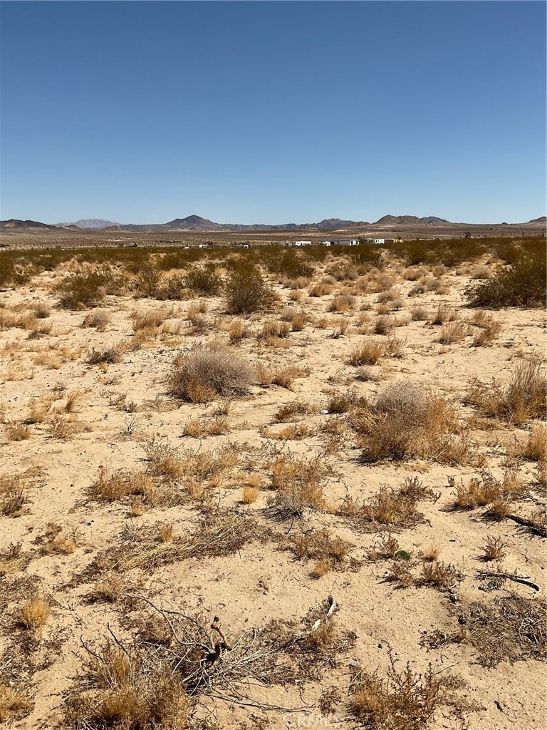 Large Corner lot located in Lucerne Valley directly off Highway 247.