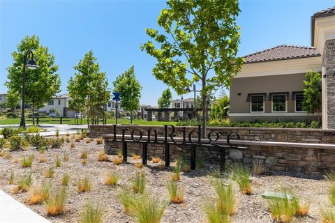 Photo of 704 Dusky Creek Crk, Lake Forest, CA 92610 (MLS # OC26028621)