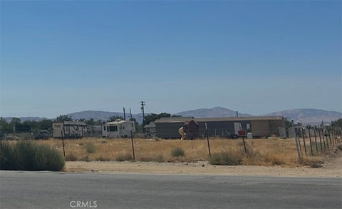 Photo of 0 90th st E, Sun Village, CA 93543 (MLS # PW26188697)