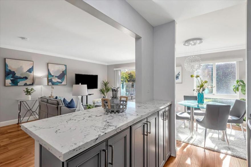 Move Right In! This stunning 1 bed, 1 bath, 693 square foot home is waiting for you! Move Right In! This updated home boasts beautiful flooring throughout, a gorgeous open kitchen with stainless steel appliances that add to the space's elegant atmosphere and opens into a separate dining area. A quaint breakfast bar is available for maximum convenience. The bathroom has also been updated with double sinks and upgraded tiling in the shower over the tub. Enjoy the courtyard view of the pool from the balcony. Enjoy this Resort-Style Community of Woodlake with 6 pools, 4 lighted tennis courts, a fully equipped gym, a clubhouse, and walking paths amongst the lush landscape and lake. Walk to Safeway, CVS, and Starbucks. Conveniently located to downtown San Mateo and Burlingame filled with numerous restaurants and shops. Come make this your new home!