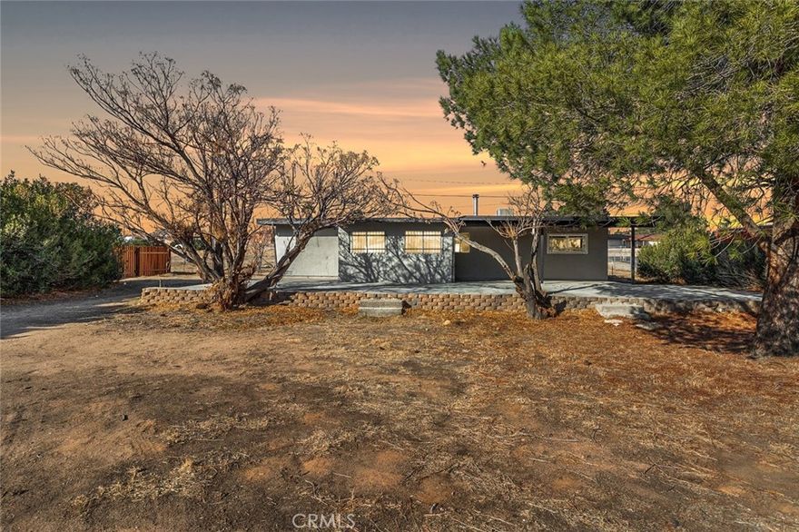 Beautifully Remodeled 3-Bedroom Home on Expansive, Usable Lot!  This stunning remodeled 3-bedroom, 1-bath home sits on an impressive 18,054 sq. ft. flat, fully usable lot, offering endless possibilities! Attached 2 car garage with direct access.  Inside, you'll find a timeless white kitchen with quartz countertops, new LVP flooring, and fresh neutral paint colors, creating a blank canvas for you to transform. The cozy fireplace in the living room adds warmth and charm, while new baseboards and central air and heat provide comfort throughout. Step outside to enjoy the covered patio in the back, perfect for outdoor entertaining or relaxing. Move-in ready and waiting for your personal touch.  FHA APPRAISAL already in at $375,000