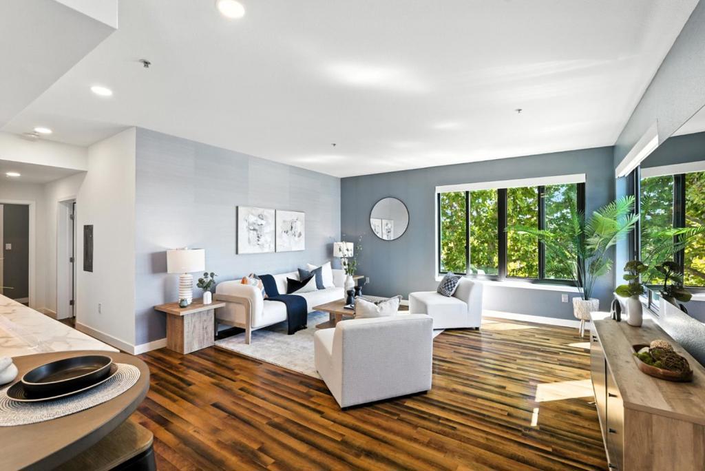 Urban living at it's best! Rare corner unit available in the highly sought after complex Plant 51. Light and bright during the day, stunning view of the city lights at night. The location is fabulous, to take advantage of both urban and Suburban lifestyles. The beautiful Rose garden neighborhood is just around the bend. Walking distance to Diridon train station and downtown San Jose, whole foods across the Street, one block from SAP. This community has incredible outdoor space features outdoor kitchen/fire pit/tranquil water features; Modern gym with Mezzanine Lounge; Bicycle Kitchen for bike storage and repair, a secured enclosed dog run. This is luxurious! Exquisitely upgraded with impeccable attention to every detail, this residence defines modern luxury. Featuring heated bathroom floors for year-round comfort, spa-like bathrooms with smart toilets, custom-built California Closets for seamless organization, electronic custom blinds by the Shade Store for a polished designer look, and a state-of-the-art Miele appliance suite for the ultimate culinary experience. Every finish and fixture has been thoughtfully selected to combine elegance with functionality, creating a home that is as sophisticated as it is comfortable.