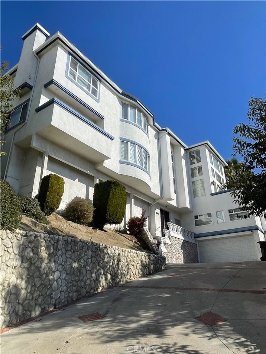 Beautifully updated 5-bedrooms, 3.5-baths home in a highly desirable Yorba Linda neighborhood with expansive city-light and hillside views. This spacious residence features an open floor plan, a remodeled chef’s kitchen with stainless steel appliances and a large island, bright living areas, and a main-level bedroom ideal for guests or an office. The primary suite includes a walk-in closet and a modern spa-inspired bathroom. Enjoy a low-maintenance backyard with a covered patio perfect for outdoor dining and sunset views. Additional highlights include updated flooring throughout, central AC, a 3-car garage, and an ideal location near top-rated PYLUSD schools, shopping, parks, and easy freeway access. Home is well-maintained and move-in ready. Rent includes regular gardening service.