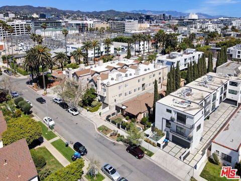 Photo of 844 N Poinsettia Place, Los Angeles, CA 90046 (MLS # 26660315)