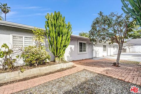 Photo of 4669 W Olympic Boulevard, Los Angeles, CA 90019 (MLS # 26651875)