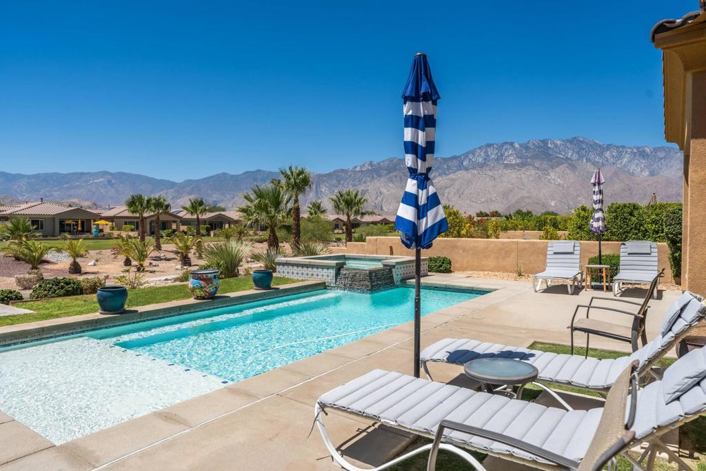 Commanding views from this Private resort-like pool home! You can have it all - you own the Land, and it's available fully furnished (just bring your toothbrush). Making it the perfect turnkey vacation rental or private home. Currently a popular and successful short term rental property 67437 S Chimayo located in The Desert Princess Country Club Resort is a Unique Property offering Investment income, Tranquility, and the perfect Desert Lifestyle. A meticulously maintained 3-bedroom, 2.5-bathroom home, just built in 2018, offers the perfect blend of modern living and a connection to nature. Wake up each morning to breathtaking vistas of the lush greenbelt and majestic mountains, a serene backdrop for your everyday life. The elevated sitting of the home provides an unparalleled vista. Days by the sparkling pool and spa, relaxing on the patio, with family and friends. Inside, discover the thoughtful floorplan and attention to detail. Open floor plan with tiled flooring in living areas, 2 and a half baths. The upgraded Desert Princess is a full-service, year-round Country club. Offering every amenity from social to fitness, clubhouse dining, and every type of sports court. Desert Living was never so easy. Call today for your private showing,