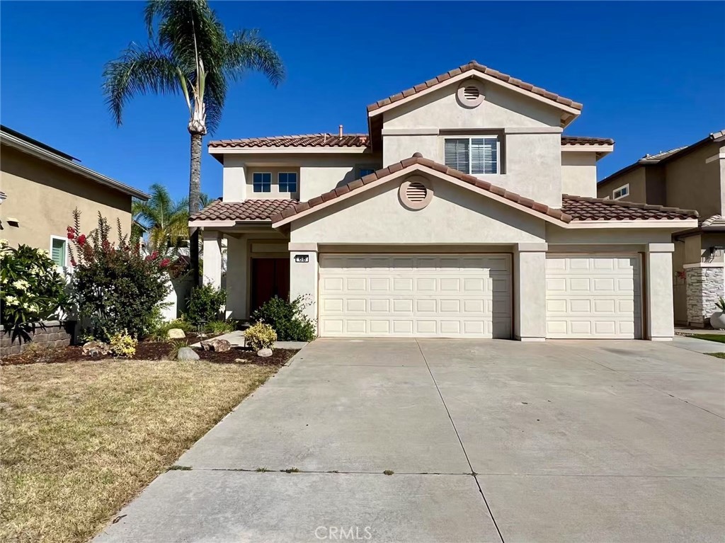This turn-key, beautiful home has been thoughtfully updated and lovingly maintained. As you enter, you'll immediately appreciate the open and airy feel of the home, with plenty of natural light flooding from large windows throughout. The updated kitchen offers sleek quartz countertops, a welcoming bar, stainless steel appliances, and plenty of cabinet space. The adjacent family room offers a cozy spot for movie nights or game days. You'll additionally find a comfortable guest room and separate bathroom on the main floor. Upstairs, you'll find three bedrooms, including an oversized master suite and a spacious laundry room. The master bedroom features a walk-in closet and an updated en-suite bathroom, complete with a double vanity and a luxurious soaking tub. Outside, the spacious backyard offers a tranquil retreat. The phenomenal citrus tree is sure to impress! Enjoy al fresco dining on the spacious patio, or relax in the sun. The property also features a three-car garage and ample driveway space for additional parking. Located on a quiet cul-the-sac in the heart of Foothill Ranch, this home and community offer easy access to a wide range of amenities and outdoor adventures such as: shopping, dining, hiking, swimming, etc. With its prime location, modern updates, and stylish finishes, this property is truly a must-see.