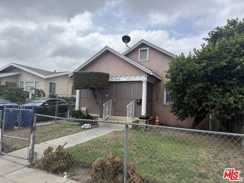 Photo of 220 E 64th Street, Los Angeles, CA 90003 (MLS # 26853957)
