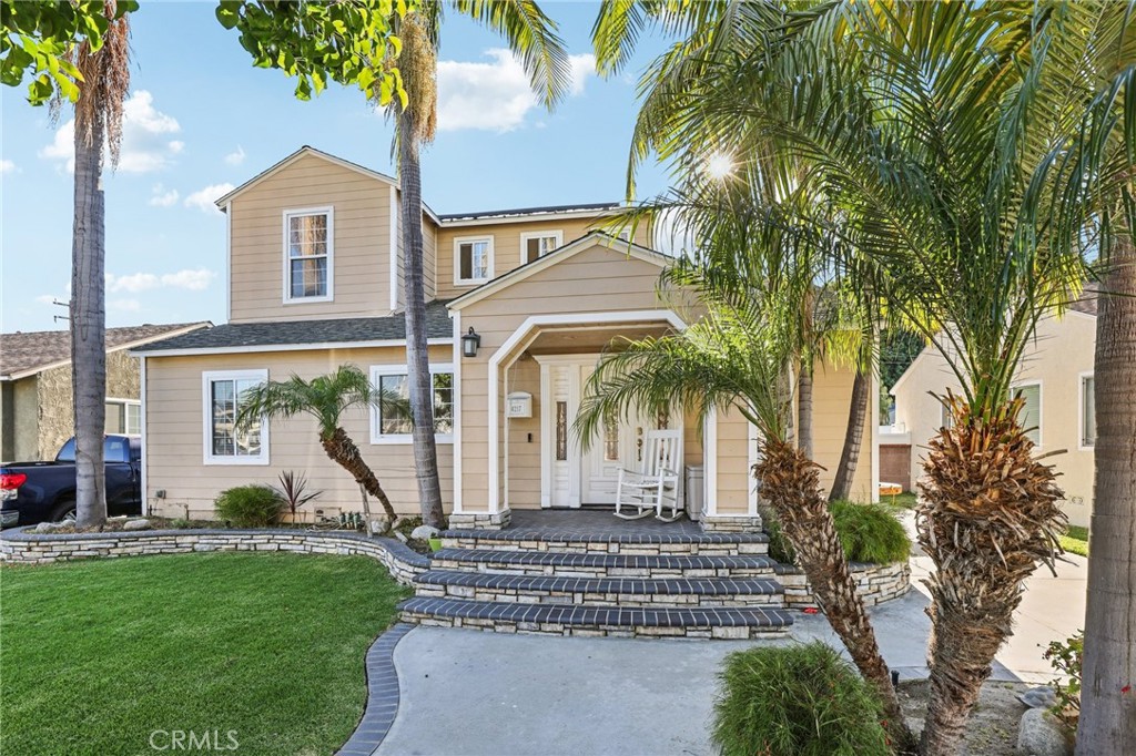 Welcome to Your Carson Park Dream Home!
Arrive into comfort, style, and SoCal charm with this beautifully updated 5-bedroom, 3-bathroom home—freshly painted, newly carpeted, and offering approximately 2,450 square feet of inviting living space designed for everyday enjoyment and unforgettable gatherings. Inside, you'll be greeted by a stunning grand staircase and a thoughtfully remodeled kitchen featuring rich maple cabinetry, granite countertops, recessed lighting, a breakfast bar, and sleek stainless-steel appliances—perfect for morning coffee or family meals. The spacious layout includes a luxurious primary suite with vaulted ceilings, a large walk-in closet, and a spa-inspired en-suite bath for your own private retreat. Additional highlights include custom designer paint, travertine floors, upgraded interior doors, textured walls, and a generously sized downstairs in law perfect bedroom with its own bath and walk-in closet—ideal for guests or multi-generational living. Enter outside through classic French doors to discover your private backyard oasis. Whether you’re hosting a summer BBQ or relaxing poolside, you’ll love the built-in grill, sparkling pool and Jacuzzi with custom stone and brickwork, and the clean lines of discreetly tucked-away pool equipment. Even the front porch radiates warmth and charm, welcoming you home every time. This one truly has it all—style, space, and the ultimate California lifestyle. We can’t wait for you to experience it in person!
