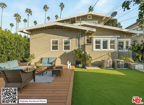 Photo of 1513 S Victoria Avenue, Los Angeles, CA 90019 (MLS # 26675195)