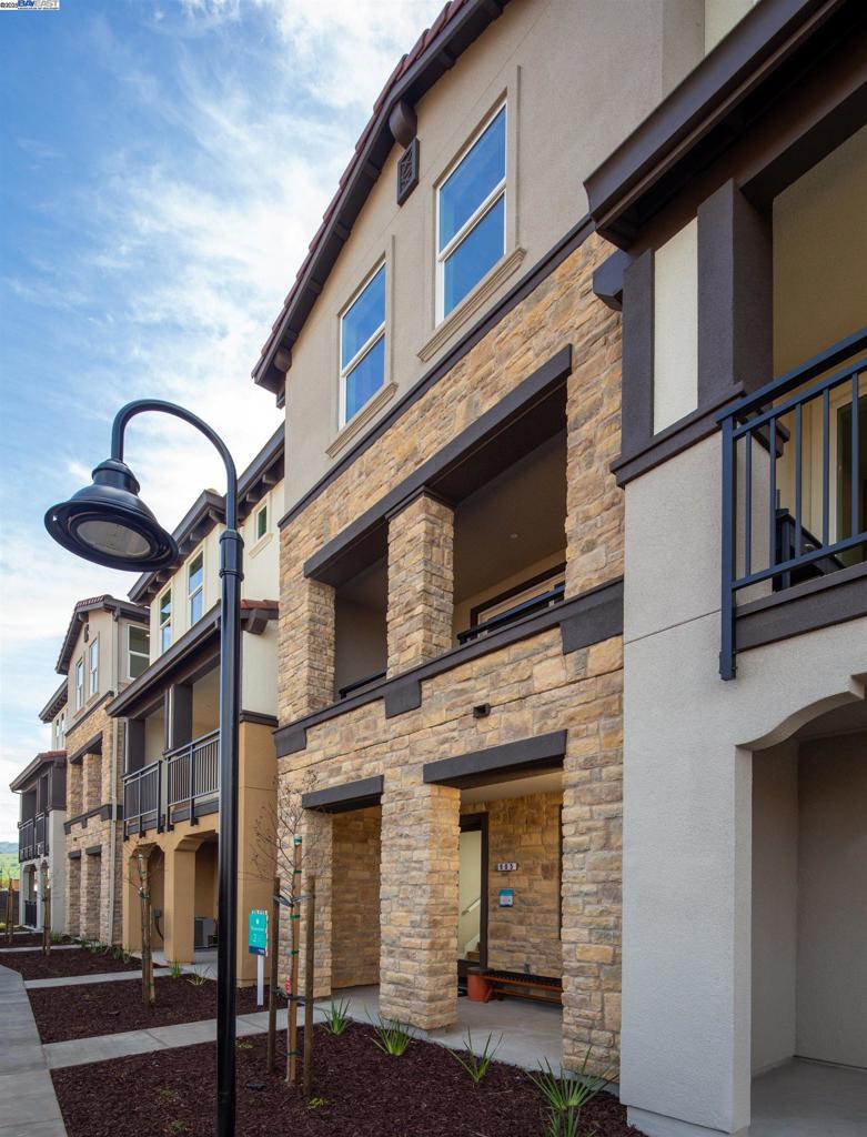 New improved pricing!!! Brand New townhome awaiting its future homeowners! Live your ideal lifestyle in this beautiful new community in Morgan Hill. Rosewood has easy access to Hwy 101 and CalTrain station just minutes away. This gorgeous townhome is perfect for the commuter. Beautiful porch welcomes you home. This home has a junior suite on the ground floor with easy access to a 2 car attached garage. Second floor boasts an expansive great room and gourmet kitchen with a convenient eat-in island. Gorgeous, upgraded cabinets throughout this unique abode. The added bonus is a spacious balcony where you can spend your evenings unwinding. Third floor has the primary suite and second bedroom. Enjoy access to the public park with BBQ area, picnic area, pathways, walking trails, playground and pickle ball court are located near Barret Ave. Also, just minutes from the downtown Morgan Hill, Santa Clara Valley Wine Trail, and hiking, biking and more!