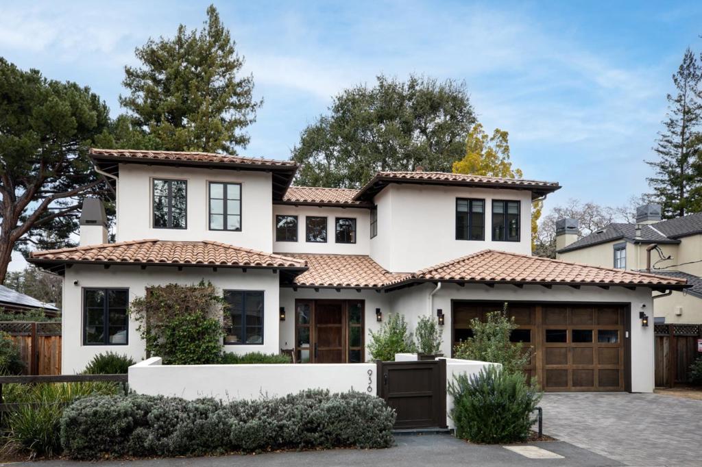Located on one of the best streets in prime west Menlo Park this home was constructed with acute attention to detail and quality in 2018 and exudes warm contemporary luxury including European wide plank wood floors on 3 levels. Open concept floor plan, living room with gas fireplace with hand forged custom iron detailing, dining room and impressive kitchen with top of the line appliances concealed in flush cabinetry with marble counter tops and Ann-Sacks tile. Large family room opens seamlessly to the rear yard with built in BBQ area with sink. Main floor en suite bedroom. Upstairs are three bedrooms including a luxurious primary suite with dual closets and bath with heated floor and curb-less shower. Lower level recreation room with 11' ceilings, refrigerated wine room, surround sound for media, fitness and en suite bedroom plus spa-like full bath.The extra deep yard is rare, bluestone patio, vast lawn, vegetable beds,fire pit and beautifully placed trees.Excellent Menlo Park Schools.