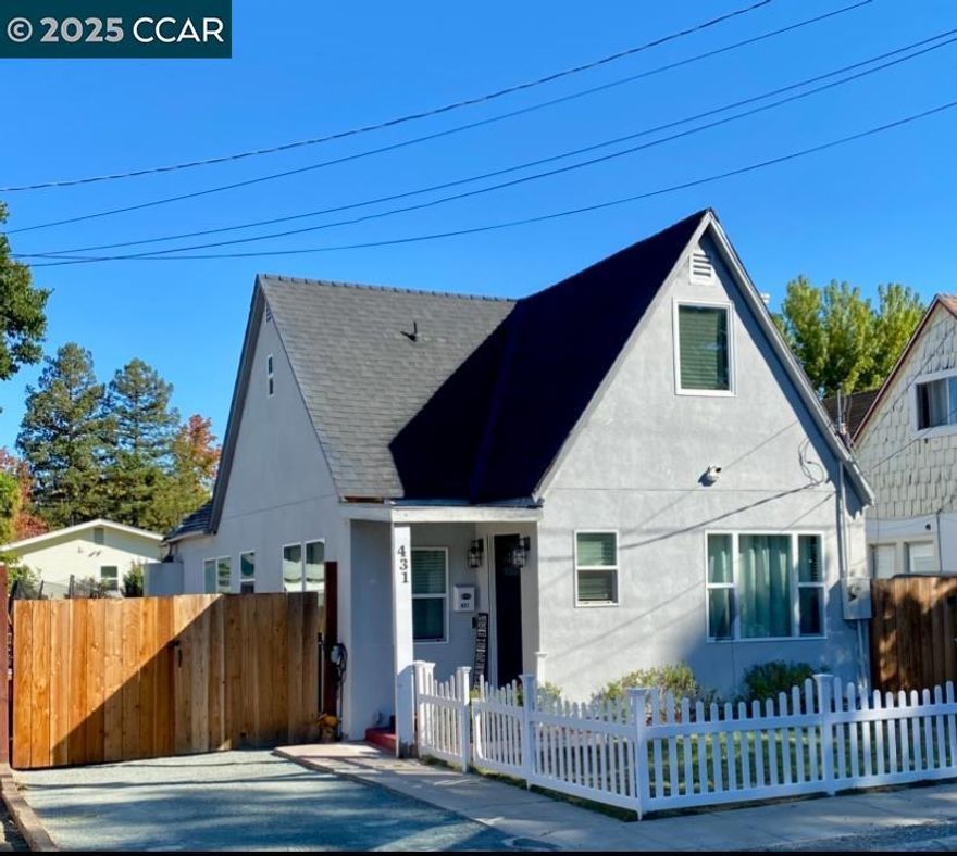 This beautifully rebuilt Tudor Style home offering 3-bedrooms and 3-full bathrooms with 1426 square feet of living space is thoughtfully designed for comfort and style.  Fully reconstructed from the studs in 2020, this gem features all new major systems and energy efficient upgrades, giving you peace of mind for years to come.  Step into an inviting open layout filled with natural light, stylish finishes and durable flooring. The kitchen has stainless appliances and a reverse-osmosis water system. 2 bedrooms and 2 bathrooms on the main level with a whimsical spiral staircase that leads to your own upstairs retreat adding architectural flair rarely found in homes.  It’s perfect for creative souls, a home office or anyone who appreciates character.  Step outside to a landscaped backyard and spacious deck ideal for entertaining or unwinding. RV parking plus a 240-volt EV charger for convenience and sustainability.   Located in a highly desired neighborhood near downtown Martinez, this property is just a short walk to Safeway, Alhambra HS, hiking trails and restaurants.  It is zoned for highly sought-after John Swett Elementary.  With its unique charm, modern updates, and unbeatable location, this home is ready for you to come see why it is one-of-a-kind.