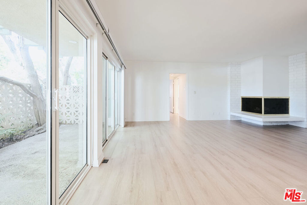 It's almost impossible to find a better two-bedroom condo in Playa del Rey than this one! Located on the first floor, it has a wood burning fireplace in the living room, a galley kitchen with stainless steel appliances, and ample cupboard space. The terrace is truly beautiful, with picturesque trees and a spacious area for enjoying the California sun. It has two bedrooms and plenty of privacy and space for comfort. With its cozy atmosphere, stunning terrace, and spacious living areas, you'll never want to leave. Off street parking for one car. Call for pets. Shared Laundry room. Common area water utility is $100.00 per month. It is a short distance to grocery stores, restaurants, and the beach. Don't miss out on this beautiful residence in Playa Del Rey!