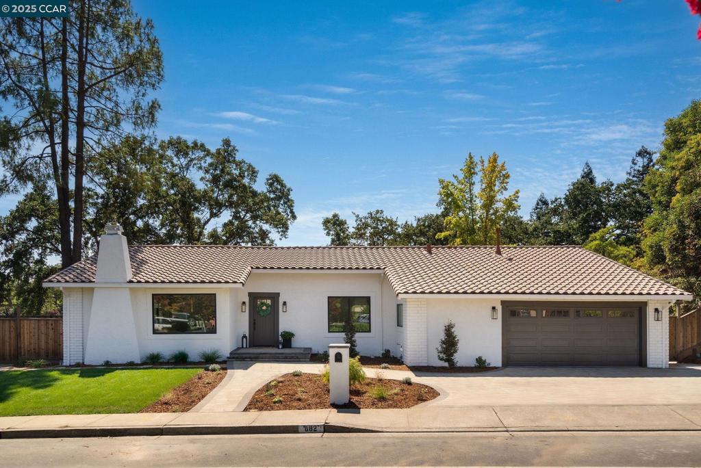 Welcome to this stunning, fully renovated single-story residence featuring 4 bedrooms, 2.5 bathrooms, 2,245± square feet of stylish living space, perfectly situated on a generous 0.43-acre lot. Step inside to discover an open-concept layout blending modern elegance with comfort. Every detail is thoughtfully renovated for privacy, functionality, & entertaining. The chef-inspired kitchen showcases quartz countertops, large center island, pendant lighting, stainless steel appliances, & abundant cabinetry. Designed for California indoor-outdoor living, the dining & family room open to a beautifully landscaped backyard. The living & family rooms feature updated fireplaces, creating inviting spaces for gatherings. The tranquil primary suite is a retreat with vaulted ceilings & outdoor access. The spa-like en-suite bath includes a French oak double vanity, & luxurious shower. Three additional bedrooms, a full bath, powder room, and laundry room complete the layout. New landscaped grounds offer lush plantings, sod, pavers, & a gazebo—perfect for outdoor dining. With room to add a pool, spa, or play area, possibilities are endless. Located near top-rated SRV schools & minutes from downtown Danville, blending modern luxury with small-town charm. Don't miss this beautifully renovated home.