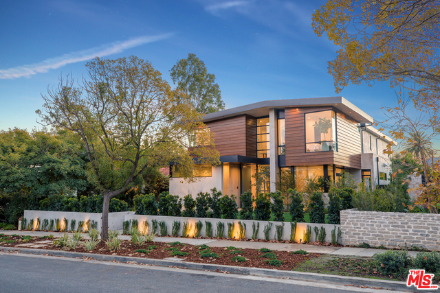 In the tree-lined streets of Santa Monica, this warm contemporary masterpiece is a stand out property among the rest. Boasting unparalleled quality and craftsmanship, it has an open floorplan, floating staircase, European white oak floors, and sophisticated design elements throughout. Floor to ceiling pocket doors create seamless indoor-outdoor living. Enjoy the outdoor entertaining areas, a grassy lawn, pool and spa, outdooorr dining with barbeque, and pool house with bar and bath. A chef-caliber kitchen boasts Miele and Zephyr appliances, center island with waterfall edge, and is completed with porcelain backsplash and countertops. Six bedrooms feature ensuite bathrooms and walk-in closets. The master suite showcases a sleek and expansive closet, and master bath with state of the art fixtures. Lower level includes theater, wine cellar, bar, game room, and outdoor lounge. Moments from Brentwood Country Mart and Montana Ave, this home affords its owner a lifestyle of rare pedigree.