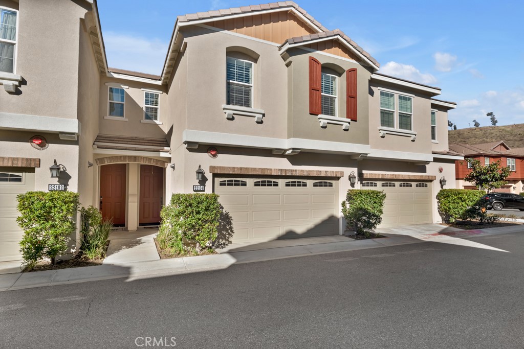 This Stunning Condominium in the Gated River Village Community of Santa Clarita offers a Spacious and Modern Living Space. The Property Offers Three Bedrooms and Two and a half Bathrooms with Approximately 1690 Square Feet. The Downstairs Area includes a Living Room, Galley Kitchen, Dining Area and a Half Bathroom. The Kitchen is equipped with Stainless Steel appliances, Quartz Counter-tops, White Cabinets, and a Pantry-Closet. Laminate Floors run throughout the Downstairs and Upstairs, along with White Shutters for a Clean and Contemporary look. Moving Upstairs you will find a Large Office Niche, an Additional Counter Area with Cabinets perfect for Storage Capabilities, Laundry Room, the Primary Bedroom and Full Bathroom which Includes a Large Walk in Closet, Dual Vanity Sinks, Separate Tub & Shower, and White Cabinets with a Quartz countertop. There are Two Guest Bedrooms and another Guest Bathroom with Dual vanity Sinks, a Quartz Counter top, White Cabinets, and a Tub-Shower. The Laundry Room Upstairs provides Convenience for Household chores. Residents can Enjoy the patio for Relaxation while Sitting under the Pergola on a hot Summer day, or take a short Walk across the street to the Beautiful Resort Style Pool, Spa or take the Children to Enjoy the Park with Play Structure. The Condominium's Location Offers easy Access to Nearby Shops and Restaurants, while being Nestled in the Beautiful Hills of Santa Clarita. Overall this Property combines Comfort, Style, and Convenience making it a Desirable place to call Home in Santa Clarita's River Village Community.