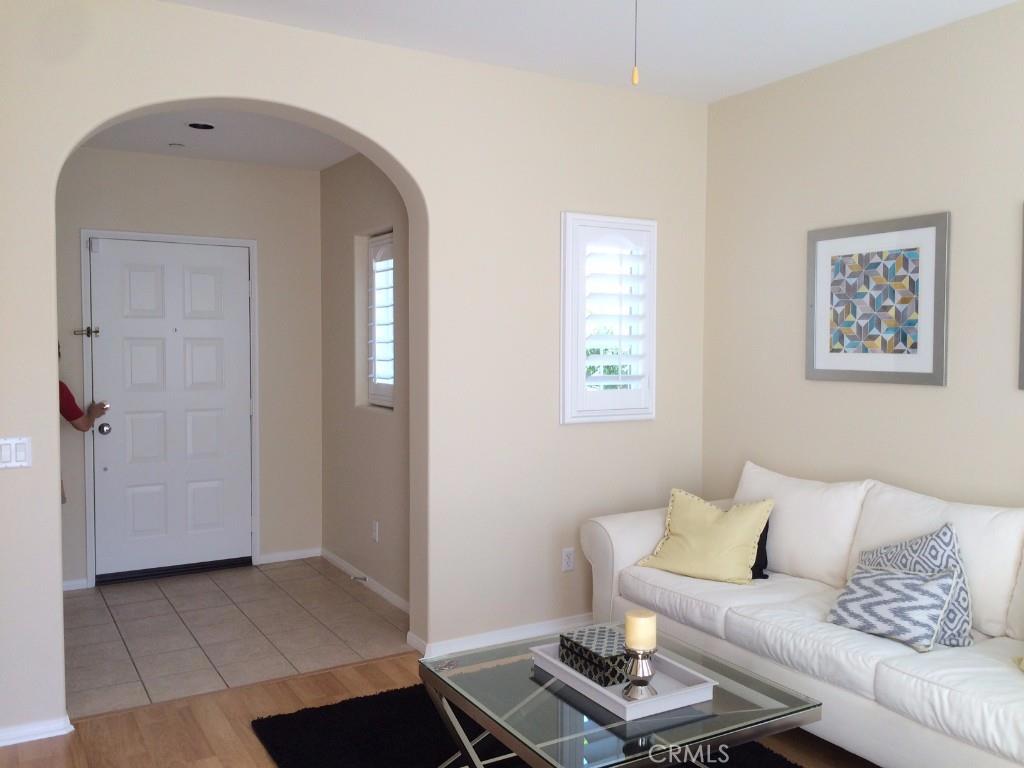 Beautiful DETACHED condo built in 2005 in “Sage Village” of Quail Hill! Located at the end of cul-de-sac and steps from the community playground. This home has 3 bedrooms, 2 car attached garage, and 2.5 bathrooms with approx. 1300 s/f. Abundance of natural light and open floor plan. Featuring upgraded plantation shutters, LAMINATE FLOOR UPSTAIRS, TILE FLOOR in all the bathrooms, and QUARTZ countertop in the kitchen with new stainless steel kitchen sink. Recess lighting, ceiling fans, and freshly painted interior. Private patio. Close to Spectrum Shopping Center and minutes from Laguna Beach. This fabulous location is within short distance to Alderwood Elementary School, neighborhood shops, Junior Olympic size community pools, Gym and the award-winning University High School. Quail Hill offers many resort style amenities, includes five parks, three pools, spas, barbecues, sport courts, gym, hiking trails and biking trails. MUST SEE!!