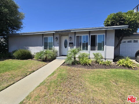 Photo of 819 E 146th Street, Compton, CA 90220 (MLS # 26887361)
