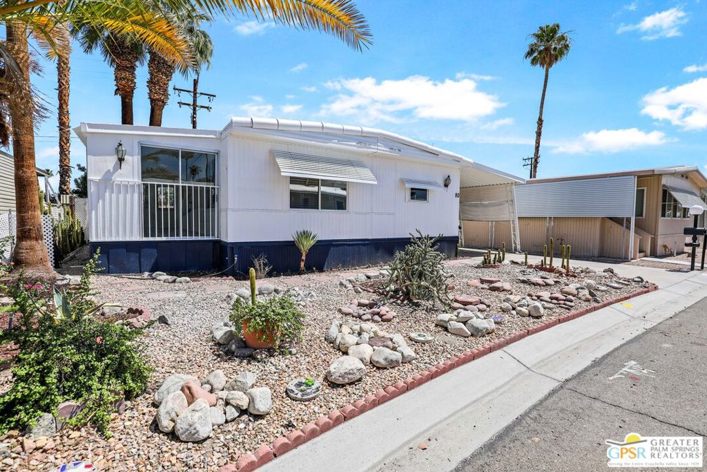 Welcome to Caliente Sands Mobile Home Park: A Senior Oasis!Located in the heart of Cathedral City, Caliente Sands Mobile Home Park is a 55+ community tailored for those seeking an enriching life in the Desert. This inviting park not only promises a prime central location but also offers a harmonious blend of comfort, privacy, and social engagement. Offering 2 spacious bedrooms and 1 bath within a generous 1,152 square feet, each home is designed for optimal living. The Bonus Florida-style room creates an additional space for relaxation or entertaining, enhancing the home's appeal. Recent upgrades include a brand-new foam roof, ensuring durability and energy efficiency. Within, the ceilings have been repaired or replaced, and luxurious vinyl flooring now stretches throughout the home, bringing both style and functionality. The aesthetic allure continues with freshly painted interiors, including walls, ceilings, and cabinets in the kitchen and bath. The exterior has also been updated with a fresh coat of paint. Landscaping upgrades further enhance the beauty of the surroundings, making it a picturesque environment for residents and visitors alike. Practical enhancements include the installation of a new gas range and vent hood, modern lighting fixtures throughout, and a tasteful kitchen backsplash that adds character. The bath now boasts a new shower surround and toilet, while new baseboards, garbage disposal, and blinds in the living room round out the list of improvements. You'll appreciate the new light switches and door locks and knobs that add convenience and security to your living space. A set of replaced front steps completes this exceptional home, making it ready for you to step into a new life! Seize this opportunity to embrace your golden years with style and comfort at Caliente Sands Mobile Home Park where community, convenience, and desert charm come together! Contact us today to schedule a tour and discover your new home! Space rent currently $657.70/mo. Park approval required.