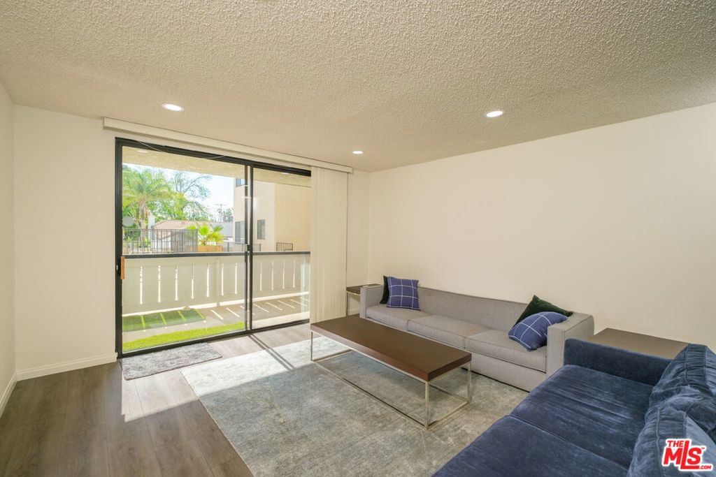 Welcome to your new oasis in the heart of Northridge! This stunning 2-bedroom, 2-bathroom condo spans 1,503 sq ft and offers a perfect blend of modern living and convenience. Step inside and be greeted by the upgraded engineered wood floors and recessed lighting throughout, creating a warm and inviting ambiance.The kitchen has been tastefully upgraded to meet your contemporary lifestyle needs. Enjoy preparing meals in the modern kitchen with premium finishes! One of the highlights of this condo is the private patio, which provides serene views of the pool. Whether you're enjoying a morning coffee or an evening sunset, the patio is the perfect place to unwind. The community offers excellent amenities, including a pool and spa, ideal for relaxation and recreation and the building features controlled entrances and an elevator for your convenience, along with an in-unit washer and dryer for added comfort. You'll have two parking spaces in the garage, making parking a breeze. Located within walking distance to the Northridge Mall, coffee shops, and restaurants, as well as a short drive to Costco and CSUN, this condo places you in the center of it all! Experience the perfect blend of comfort, style, and location in this exquisite Northridge condo. Don't miss the chance to make it your new home!