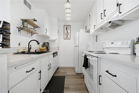 Photo of 23515 Lyons Ave #233, Valencia, CA 91355 (MLS # SR26048131)