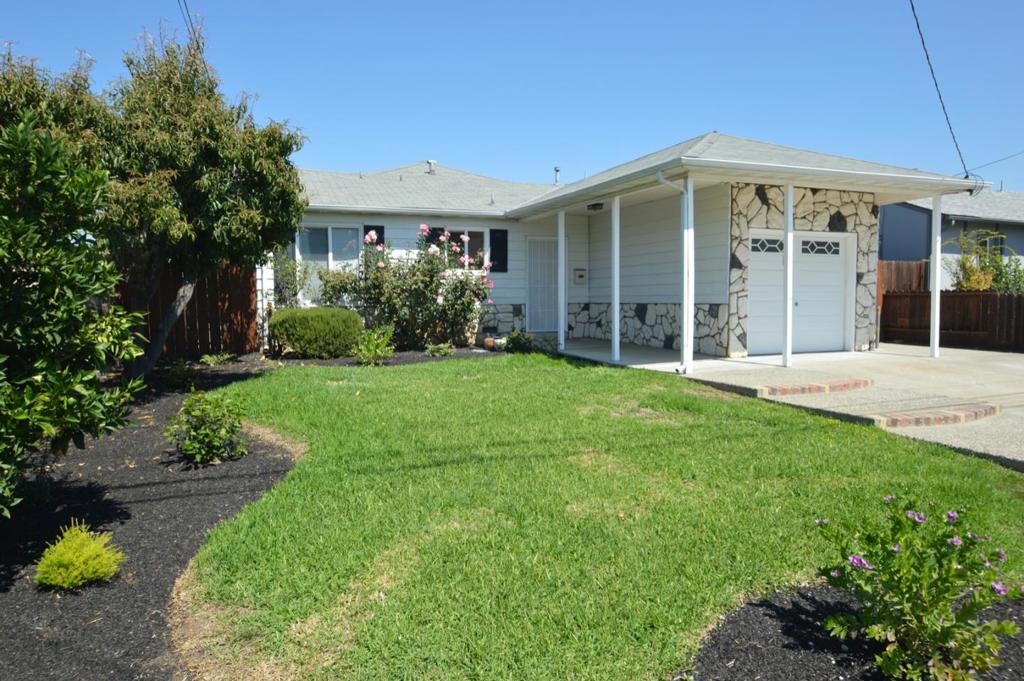 Welcome to Fairway Park! Home located on quiet street. Exterior is beautifully landscaped. Open area floor plan with large living room with hardwood floors! Kitchen is combined with dining area. The kitchen has stainless steel stove, built-in microwave, and dishwasher. The countertops are granite. The bathroom is tiled with tub over shower with glass sliding doors. The backyard has a covered concrete patio, and natural grass with automatic sprinklers.