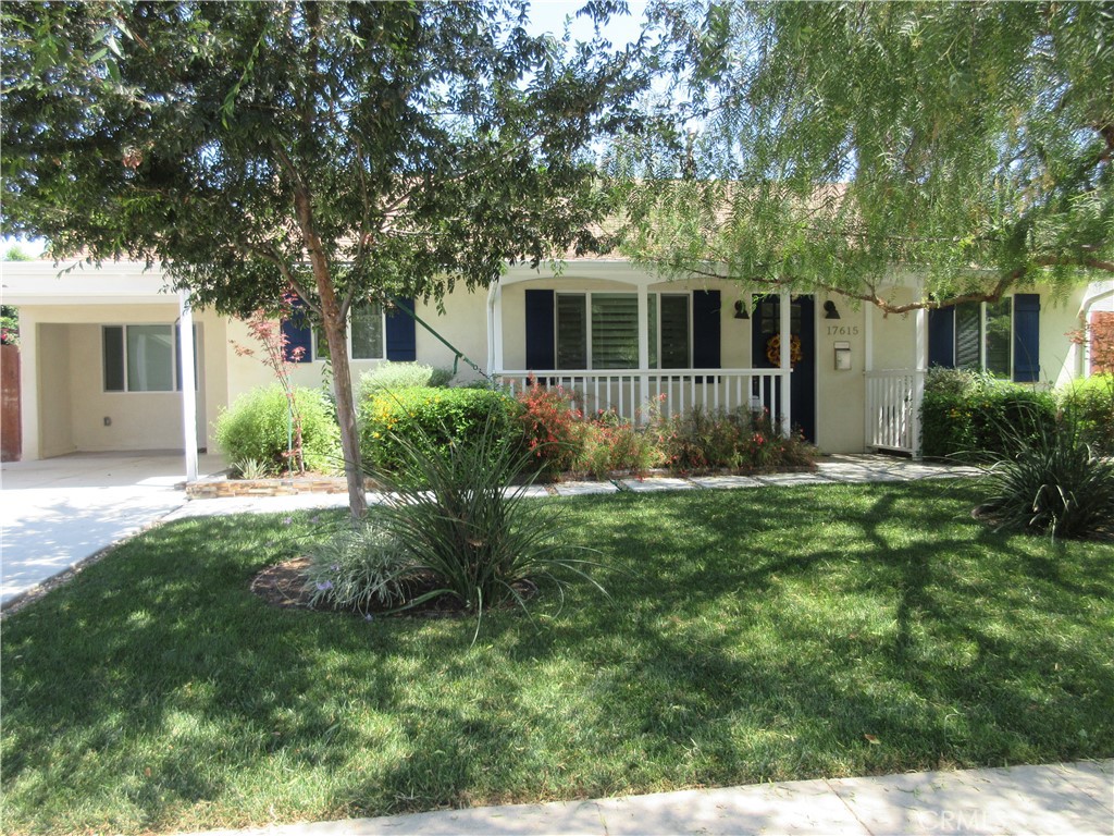 This beautifully updated 3 bedroom and 2 bath home blends traditional charm with contemporary elements. When you walk in you are welcomed to an amazing open floor plan with a large, bright airy living area and double sliding glass doors leading to a landscaped backyard where you can enjoy cozy evenings around the block fire pit, ideal for relaxing or entertaining. The remodeled gorgeous kitchen has stainless steel appliances and a single-basin farm-style sink. The primary bedroom is a peaceful retreat, featuring private access to the backyard through its own sliding glass door. The remodeled en-suite bathroom showcases a stylish barn door and includes a convenient enclosed area with a stackable washer and dryer (non-warranted) for your use. Property comes with a non-warranted refrigerator and wine cooler for your use. Carport with EV charger. Gardener included