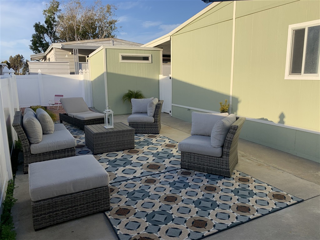 A renovated home with you in mind settled in a private cul-de-sac boasting a back patio with new fencing and patio furniture. Enjoy western sunsets, entertain guests or simply relax reading a book in this gem of a home. Walk inside and immediately at ease as great pride and care have gone into making this a home anyone can be proud of. Located a short drive to beach communities and just south of downtown San Diego within a beautiful gated 55+ adult community with low space rent and no tax roll. Neighborhoods: Otay Mesa Complex Features: ,,,,,,, Equipment: Dryer, Shed(s), Washer Other Fees: 0 Sewer: Sewer Connected Topography: RSLP