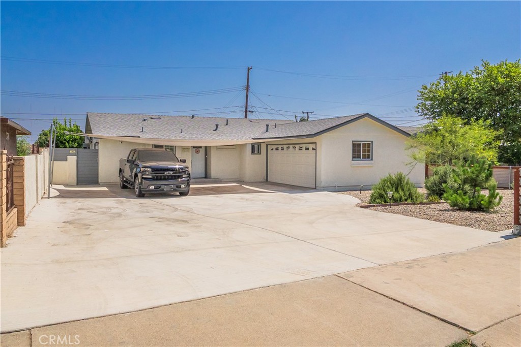 Gorgeous remodeled 3-bedroom, 2-bath home in the desirable neighborhood of Hacienda Heights. This turnkey property offers a wide range of updated amenities, including a fully remodeled kitchen with quartz countertops, new cabinets, a new stove with built-in range hood, and an open layout that flows into the spacious living room. The kitchen also features a large island with quartz countertops and breakfast bar seating—perfect for entertaining. Enjoy new laminate and tile flooring throughout, freshly painted interior, and generously sized bedrooms. Both bathrooms have been beautifully remodeled. Modern touches include new fixtures, recessed lighting, a new slider, and updated windows. The home comes equipped with a refrigerator, washer and dryer, and a security camera system for peace of mind. The backyard features a separate structure with a brand-new sauna/steam room. Another detached structure offers flexible use as a studio, possible ADU, or storage space. A huge covered patio provides an ideal space for outdoor gatherings. Additional highlights include a new roof, upgraded electrical panel, multiple mini-split AC units, block walls, a new concrete driveway with parking for up to five cars, and a 2-car automatic garage. Fresh front landscaping completes this move-in-ready gem.