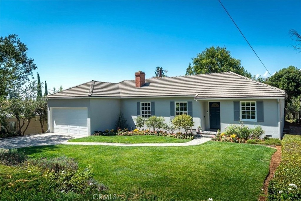 Welcome to this charming, renovated home that beautifully blends timeless character with modern refinement. This meticulously updated single-story traditional home offers 3 spacious bedrooms and 2 bathrooms, thoughtfully designed for comfort, function, and style. With all new plank flooring and an updated fireplace, abundant natural light highlights the charm of the spacious living room, which flows effortlessly into a formal dining area—ideal for refined entertaining.
The kitchen has been tastefully upgraded with premium materials and finishes, featuring ample custom cabinetry, elegant quartzite countertops, premium appliances including built in fridge and wine fridge and even features an elegant wet bar/coffee bar. A bright sunroom with natural light provides the perfect flex space for a home office, reading lounge, or play area. The serene primary suite includes a remodeled en-suite bath and opens directly to a private patio and lush backyard with mature landscaping—an inviting setting for outdoor dining or quiet retreat.
Situated on a quaint street near shops, dining, and top-rated La Cananda Flintridge schools, this exceptional lease offers an unparalleled opportunity to live in a fully upgraded home that is one of the most sought-after areas of Los Angeles. This home is zoned for La Canada Flintridge Unified School District.
