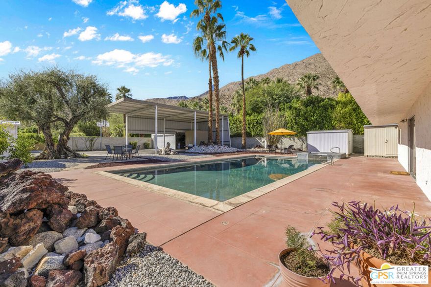 Located in the exclusive enclave of The Mesa, this rare flat 11,761 sq. ft. lot offers a one-of-a-kind opportunity for builders, developers, or end users looking to create a premier Palm Springs estate. Backdropped by stunning San Jacinto Mountain views, this property combines location, scale, and potential in one of the city's most desirable neighborhoods.  Currently on the property is a 1,007 sq. ft. pool house, featuring a full kitchen, living room, one bedroom, and 1.5 baths - a perfect setup for guest use, rental, or interim living during development. The oversized 20x40 pool is already in place, providing a head start on your future outdoor living vision.  This is not a hillside property.  The flat terrain allows for more flexible design, easier construction logistics, and greater creative freedom.  A freestanding RV carport adds functionality and optionality.  Whether you're looking to build new, expand, or reimagine, this property is a (mostly) blank slate in a neighborhood known for its privacy, architectural pedigree, and luxury appeal. The Mesa has long attracted high-end custom homes and discerning buyers.  This is your chance to stake a claim.  Don't miss this rare development opportunity in one of Palm Springs' most iconic and sought-after locations.