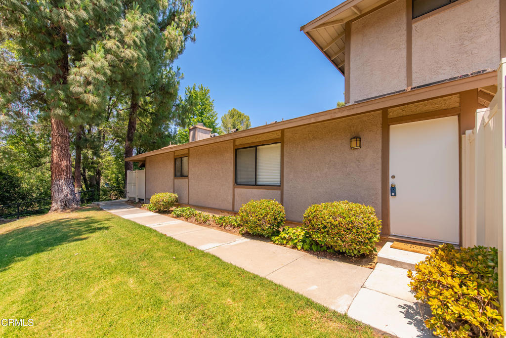 Mature trees & lush landscaping set the tranquil tone as you're welcomed into the beautifully maintained Annandale 2 community! Nestled in desirable Agoura Hills, this charming home offers immediate visual appeal while blending comfort, style & serenity. Abundant natural light highlights the modern interior canvas of soft grays & off-whites with recessed lighting & luxury vinyl plank flooring. The remodeled kitchen showcases rich, upgraded cabinetry, timeless granite counters & stainless-steel appliances. Interior laundry area, sizeable bedrooms & two separate private patios offering options for gardening, outdoor dining, lounging & more. Community amenities include a beautiful pool, spa, clubhouse, & peaceful, lovely greenbelts. HOA pays water and sewer, has new roof scheduled in March 2026. Middle carport is assigned to property, and a second parking space is assigned too! Conveniently located near Agoura High School, gorgeous Chumash Park, shopping, dining with easy access to the 101 freeway, trails, open space preserves and local beaches!