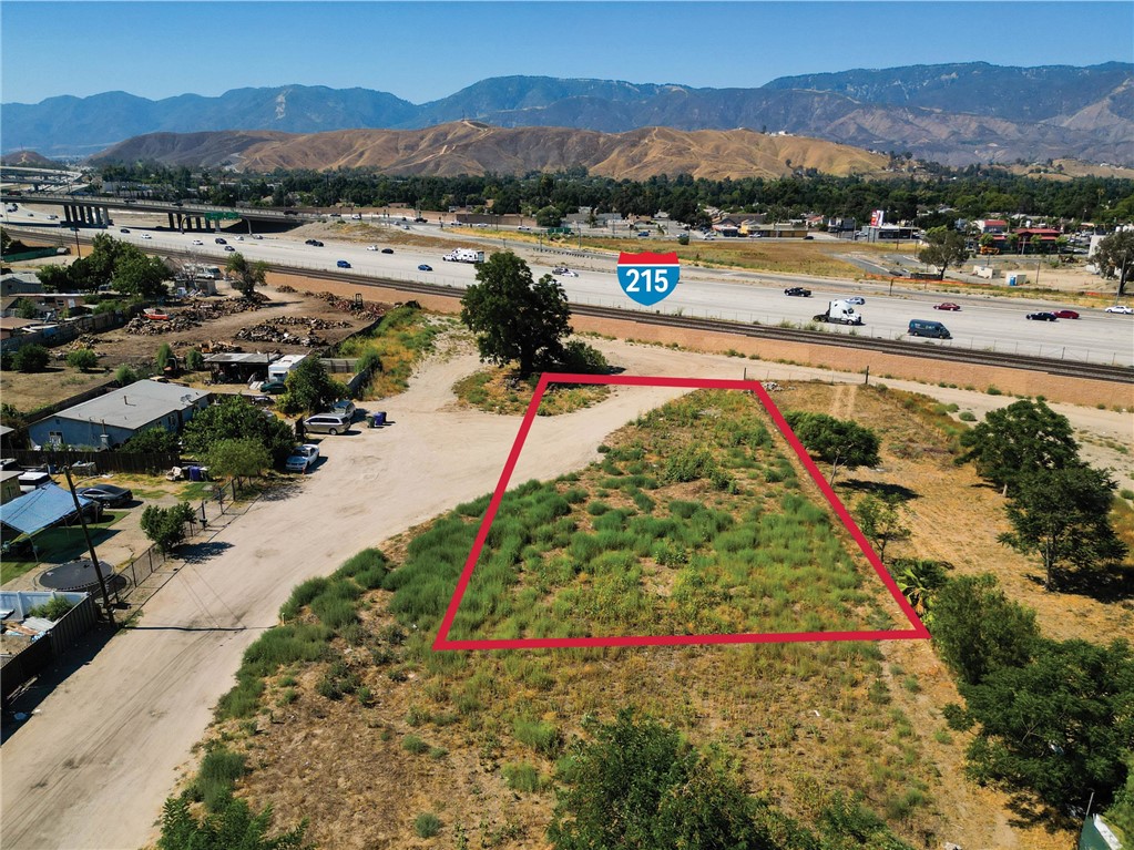 This half (1/2) acre parcel of land is located on a private cul-de-sac and ideal for one who seeks privacy. Given the zoning (min 7,200 sf per dwelling unit) buyer could potentially entitle to build three (3) single family residences to either lease out, live in or sell them out individually. This site is located just a short drive from the 215 freeway, Stater Brothers, Home Depot and more. Nice flat site that should be easy to develop. Buyer to verify all as needed with city. OPPORTUNITY ZONE so potential tax benefits.