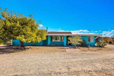 Photo of 3613 Sage Avenue, Yucca Valley, CA 92284 (MLS # JT25248630)