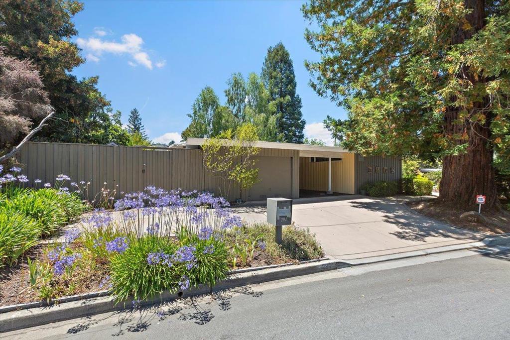 Mid-century modern diamond in the rough. Unlock the full potential of this 4-bedroom, 2-bath mid-century modern gem nestled in the desirable Ladera neighborhood. Set on a private and spacious corner lot with mature landscaping, this home is brimming with opportunity for the savvy buyer to renovate and restore its original charm or build your dream home from the ground up. Convenient to the Ladera Shopper, Ladera Rec, school bus stop, Stanford 3.5 miles, easy access to Silicon Valley, commute routes & mid-way between SFO & SJC International airports. This is your chance to create your dream home in one of the Peninsula's most sought-after communities.