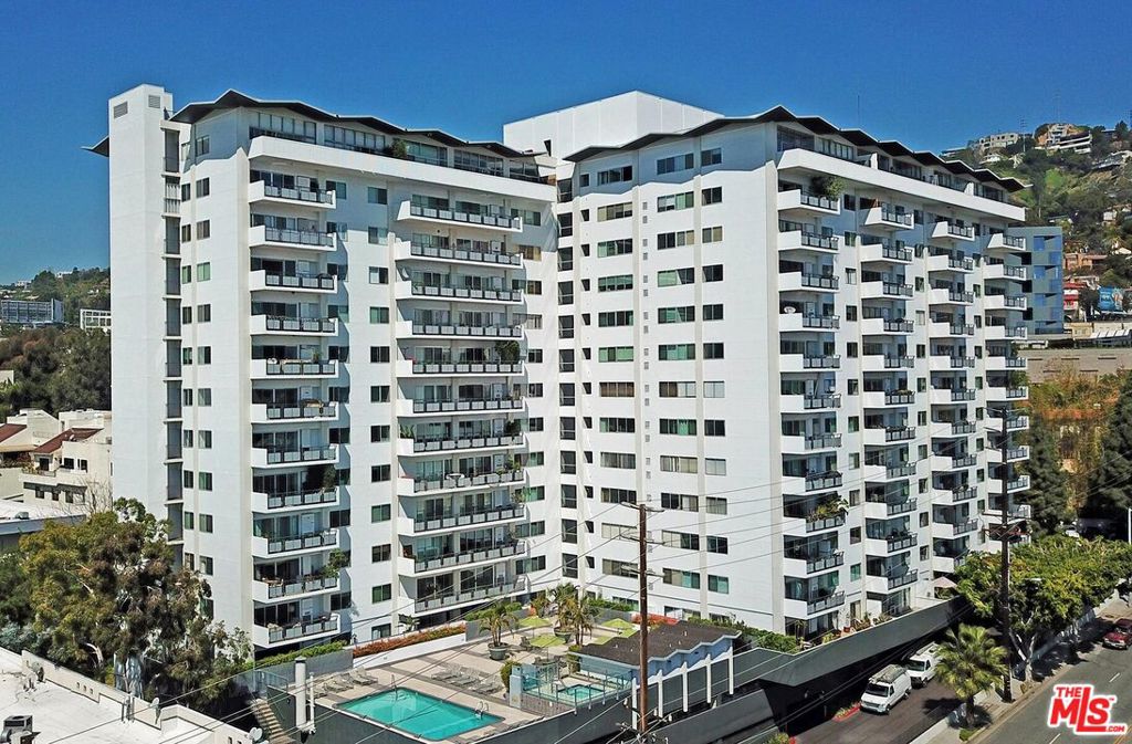 An exceptional opportunity awaits to reside in one of West Hollywood's most coveted buildings. This expansive 1-bedroom, 1-bathroom condominium offers breathtaking panoramic views stretching from Downtown LA to the Hollywood Hills. Thoughtfully upgraded, it showcases designer touches, including venetian plaster walls, double-pane windows, a smart home system, updated kitchen and bathroom, and elegant hardwood flooring.Residents enjoy a host of building amenities, such as valet parking, 24-hour security, a dog park, a fitness center, a heated pool and spa, and a versatile recreation room ideal for meetings, events, and gatherings. The location provides easy access to the vibrant Sunset Strip, with its new hotels, shops, and restaurants, all within close proximity. Positioned strategically, the residence is just minutes away from Beverly Hills and various local attractions. Don't miss the chance to call this prime location home.
