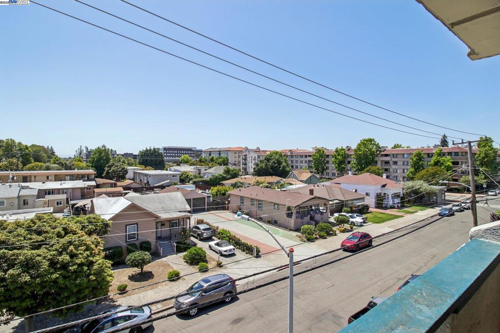 Welcome to move in ready 2-bedroom, 1.5-bathroom condominium offering comfort, convenience, and city living at its best with no rental restrictions. Located in a secured building just steps from BART, restaurants, grocery stores, and shopping, this home places you in the center of everything San Leandro has to offer. Step inside to discover a light-filled interior with fresh paint throughout and a private balcony with amazing views. The large living room and dining area provide an ideal space for entertaining or unwinding after a busy day. The spacious bedrooms offer generous closet space, while the 1.5 bathrooms deliver functionality and flexibility for everyday living. Enjoy the convenience of in-unit laundry, secure parking with extra storage, and peace of mind in a well-maintained, secured community. Whether you're commuting to the city or enjoying the vibrant local scene, this home combines comfort and location in one perfect package. Some photos have been digitally staged.