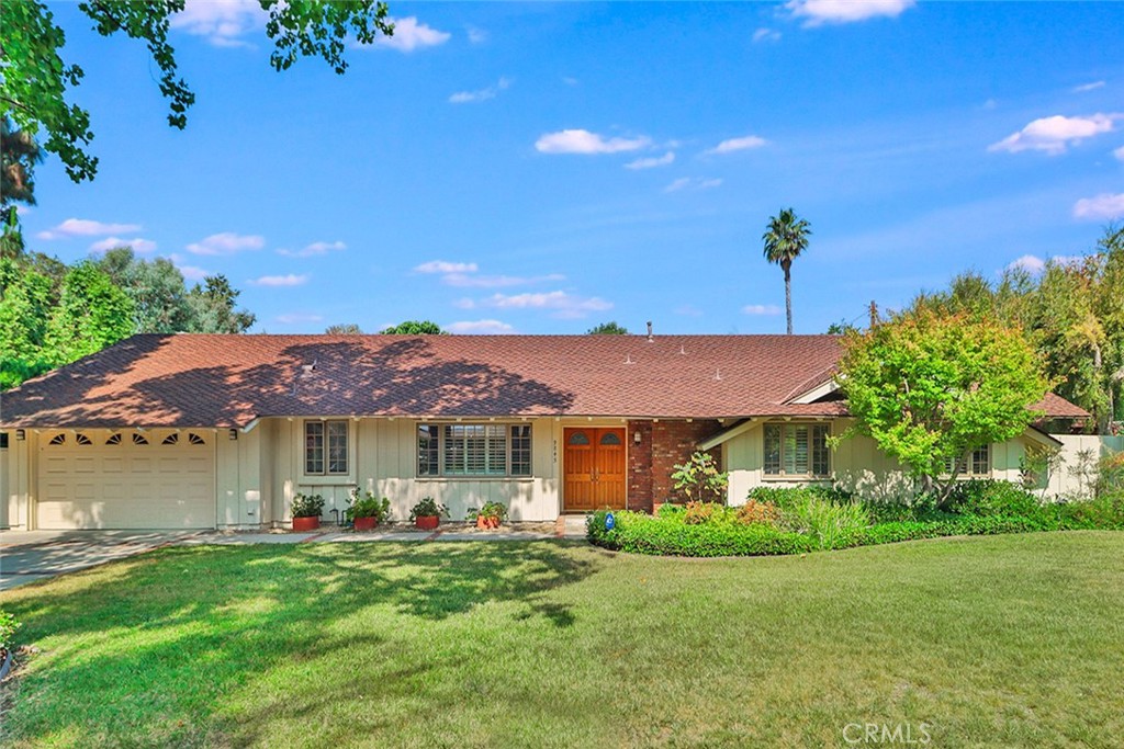 Great New Price**You will love this single story ranch home with 2 car garage, 5 Bedrooms, 3 Bathrooms, 2,360 Sq.Ft. of living space, on a 12,304 Sq.Ft. Lot. Fabulous home with double door entry that leads you into the foyer with custom African slate tile. Updated kitchen with recessed lighting, window shutters, tile flooring, granite countertops and large center island, plus custom built-ins in the kitchen and breakfast area for extra storage and glass cabinets with additional lighting! Appliances include: KitchenAid dishwasher, Built-in Sharp microwave, Miele 5 burner gas stovetop, double ovens, Sub-zero refrigerator and freezer. Living room is light and bright and perfect for entertaining with a custom fireplace, additional overhead lighting, and is open to the large formal dining room with a sliding glass door to the backyard. Fifth bedroom (with ¾ bathroom) also has a sliding glass door to the backyard; could be used as a bedroom or a den. Four more bedrooms on the other side of the house. The primary bedroom is large with sliders to the backyard, plantation shutters, walk-in closet, and Ensuite bathroom with 2 sinks, step down tub/shower with view to the outside blending the indoor facilities with the beauty and serenity of nature. All bedrooms of good size. Full hallway bathroom with tub and shower. Backyard featuring a really nice outside patio with overhang, lush mature landscaping, large grass area, and concrete side yard. Located in the Granada Hills Charter High School district.
