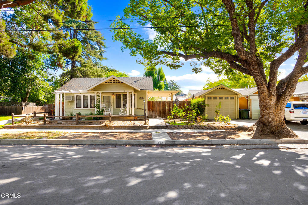 Discover this charming Craftsman-style bungalow nestled in the heart of Normandie Heights, where timeless character meets modern potential. Brimming with old-world charm, this darling pied-a-terre showcases its original features -- from built-in shelving and a vintage desk to gleaming hardwood floors and a cozy fireplace that anchors the living space. The spacious attic, following the full footprint of the home with tall ceilings, offers exciting potential for expansion or a creative retreat. Outside, a large, low-maintenance patio provides the perfect sanctuary for relaxing or entertaining under the Pasadena sky. With PAID for solar panels and it's prime location near local parks, trails, and city conveniences, this home offers the warmth of a classic bungalow and the ease of single-level living -- a truly special find and a wonderful alternative to condominium living.