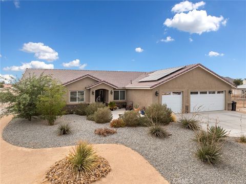 Photo of 15620 Erie Road, Apple Valley, CA 92307 (MLS # CV26106227)