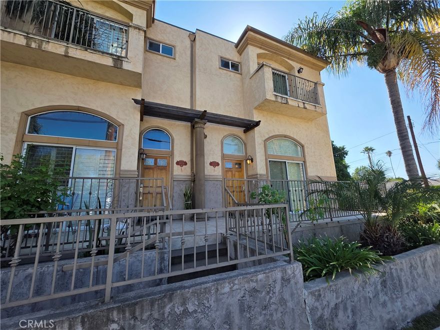 Welcome to 18338 Rayen Street, Northridge, CA 91325! This beautifully upgraded corner tri-level townhome features 3 bedrooms and 3 bathrooms, showcasing a bright open living room with high ceilings, laminate flooring, custom shutters, and a cozy fireplace. The remodeled kitchen boasts quartz countertops, a designer backsplash, white shaker cabinets, stainless steel appliances, and a sleek range hood, opening to a spacious family room perfect for entertaining. The primary suite offers a walk-in custom closet and a luxurious en-suite bath with dual sinks, a jetted tub, and a separate shower. Additional highlights include two secondary bedrooms, multiple balconies, and a direct-access two-car garage with washer and dryer. Ideally located near CSUN, shopping, dining, parks, and public transit, this home blends modern comfort, style, and convenience in the heart of Northridge.