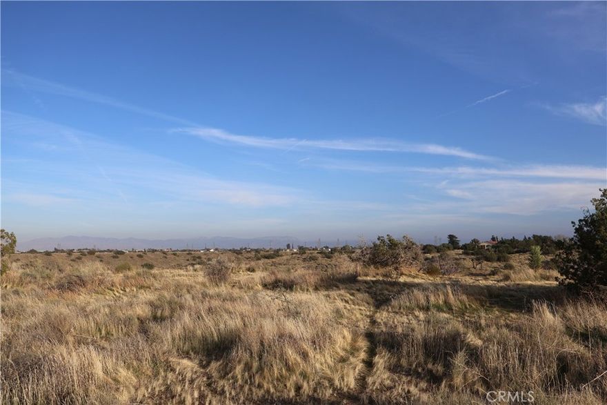 Views! Welcome to Oak Hills a well desired location in the High Desert. Valued for a spacious lifestyle that is characterized by large open spaces, fresh air, dark skies and breathtaking views of the mountains and desert. The community embraces outdoor recreation and equestrian activities. Zoned for rural living, low density, large lot, single family, detached residential units with some allowance for rural and agricultural uses. Highway 395 and the 15 freeway are real close. Commuter friendly location. Amenities are right down the road. Shopping centers, and restaurants are about 5 minutes from the property. The New 2.5 Million Square Foot Amazon Warehouse will also be a stone throw away (visible from the property). This growth is expected to lead to more local construction jobs, along with new opportunities for housing, shopping, and dining. Perfect property for your dream home or investment. Great for developers who are looking into purchasing land to subdivide and develop! This opportunity is a must see!