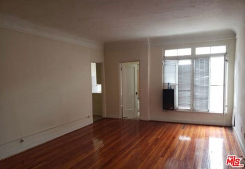 Photo of 607 S Dunsmuir Avenue, Los Angeles, CA 90036 (MLS # 26985629)