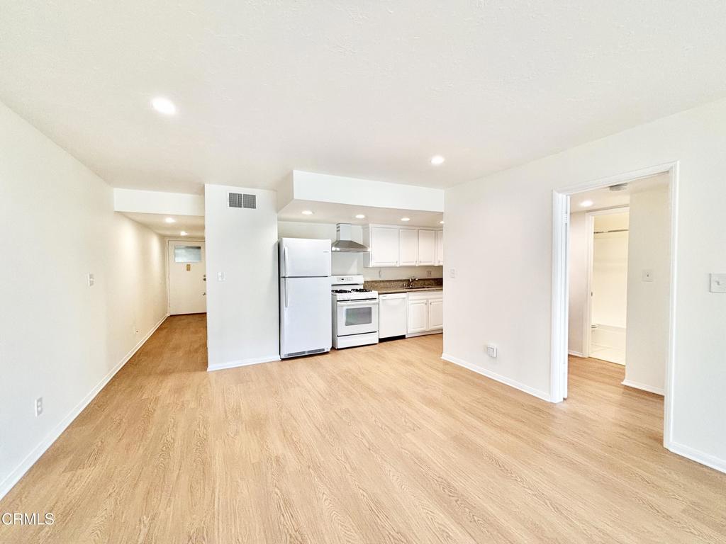 Welcome to coastal living at its finest. Located in the highly desirable Surfside community in Port Hueneme, this spacious 2-bedroom, 2-bathroom home offers a bright open floor plan and unbeatable proximity to the beach--just across the street.Upon entry, you're greeted by a light-filled living space. To the left, the first bedroom features its own closet, bathroom, and in-unit stacked laundry for added convenience. Continue into the open-concept living room, dining area, and kitchen, where natural light pours in through a sliding glass door that opens to your private patio. Tucked toward the back, the primary suite offers a peaceful retreat, complete with an en suite bathroom, ample closet space, and direct access to the patio.This home also includes assigned covered parking and full access to the community's clubhouse, gym, pool, and spa. Located just steps from the sand and within close reach of local shops, restaurants, and public transportation, this is your chance to enjoy low-maintenance, resort-style living by the beach. Schedule your showing today.