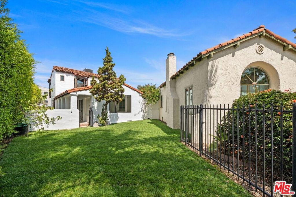 Prime Beverly Grove Spanish Home for LeaseThis fully gated, two-story Spanish-style residence sits on a generous 6,500 sq. ft. corner lot in the heart of Beverly Grove. The home features 4 bedrooms, including 3 upstairs and a versatile downstairs bedroom that can double as a home office. A spacious bonus/flex area offers endless possibilities for work, play, or entertaining.Designed with seamless indooroutdoor flow, the property includes a private pool and jacuzzi, perfect for relaxing or hosting. Additional highlights include off-street parking and timeless Spanish character enhanced with modern conveniences a rare Beverly Grove rental opportunity. FIRST SHOWING IS THIS SATURDAY SEPT 6TH 12PM TO 2PM